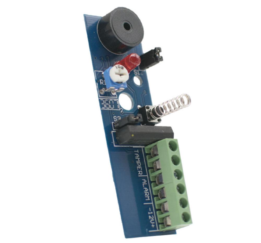 Internal PCB board of AS-971 alarm detector featuring piezoelectric sensor and adjustable sensitivity.